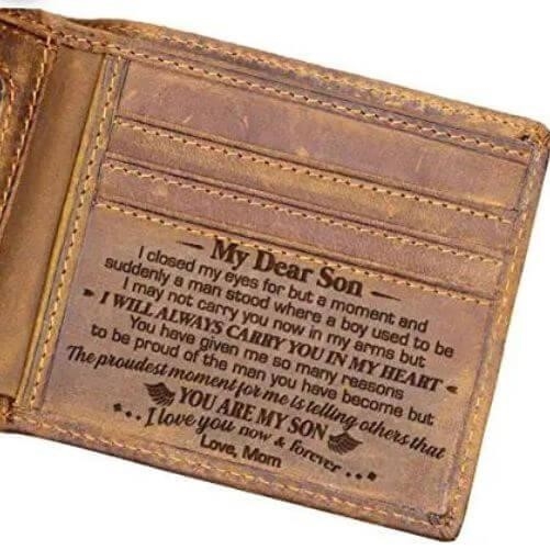 A wallet made of leather with an engraved