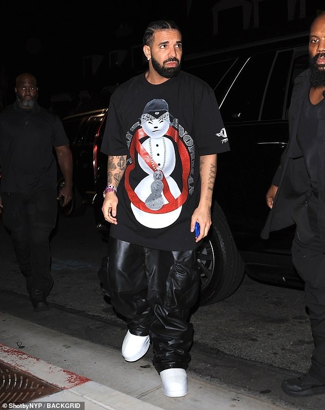 Drake wears a Jeezy T shirt at after party for LA tour stop. as some fans express disappointment over his performance and even leave EARLY